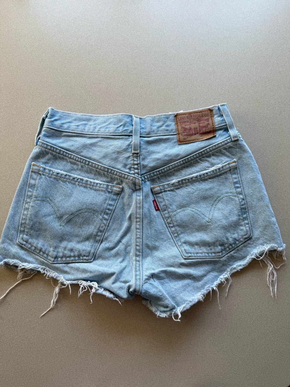 Levi's Light Blue Cutoff Denim Shorts with Frayed Hem
